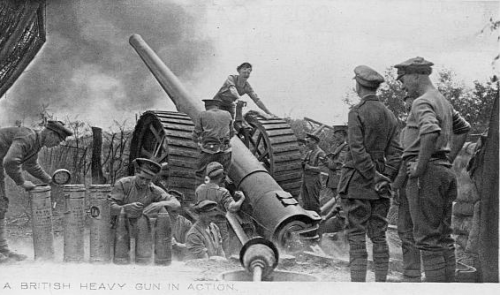 Soldiers operate a cannon as other officers look on